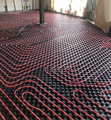 Messa in opera di impianti di riscaldamento a pavimento